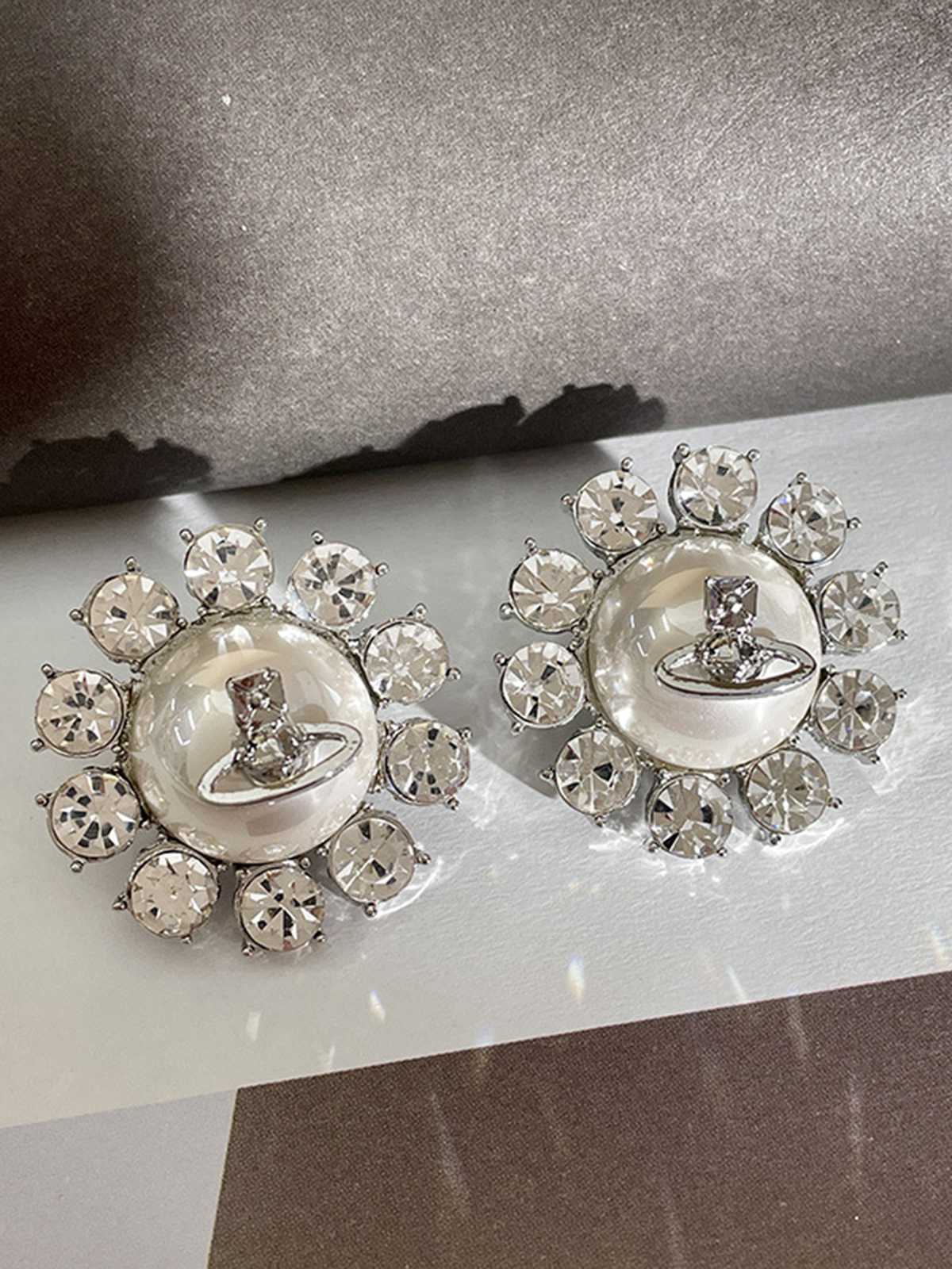 Boucles d'oreilles rétro en argent avec perles et diamants - Image 4