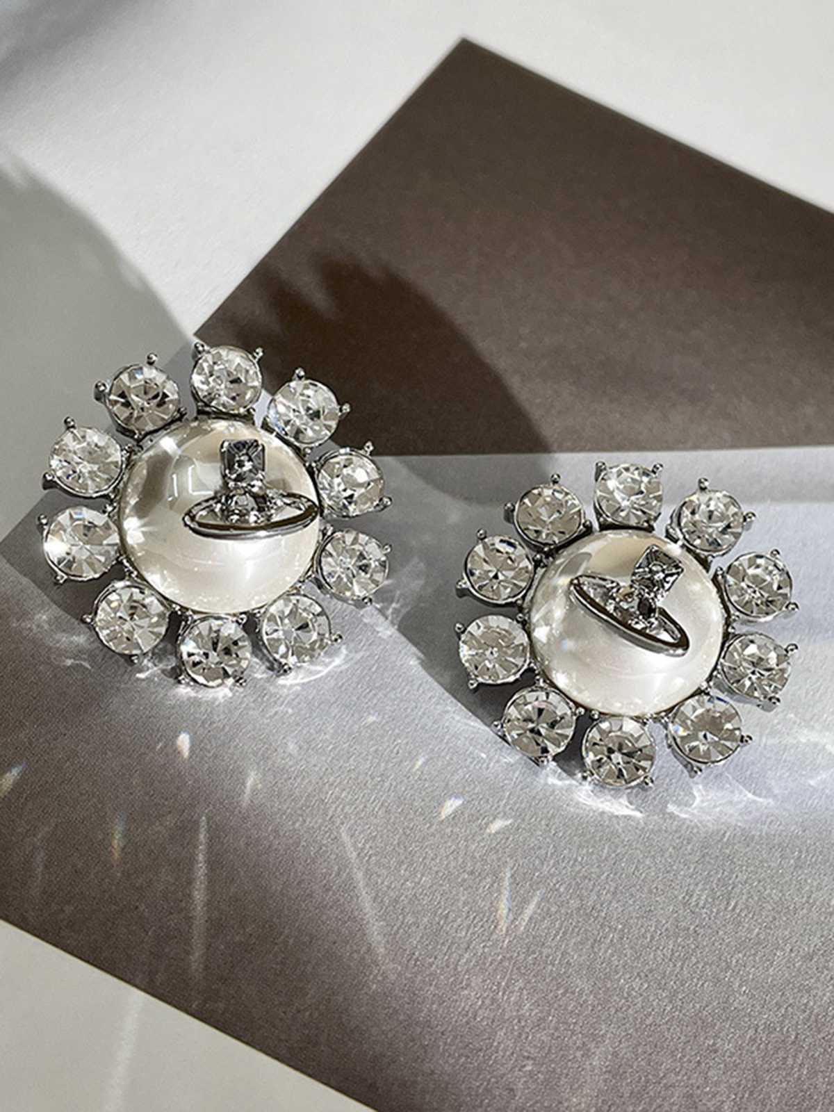Boucles d'oreilles rétro en argent avec perles et diamants - Image 7