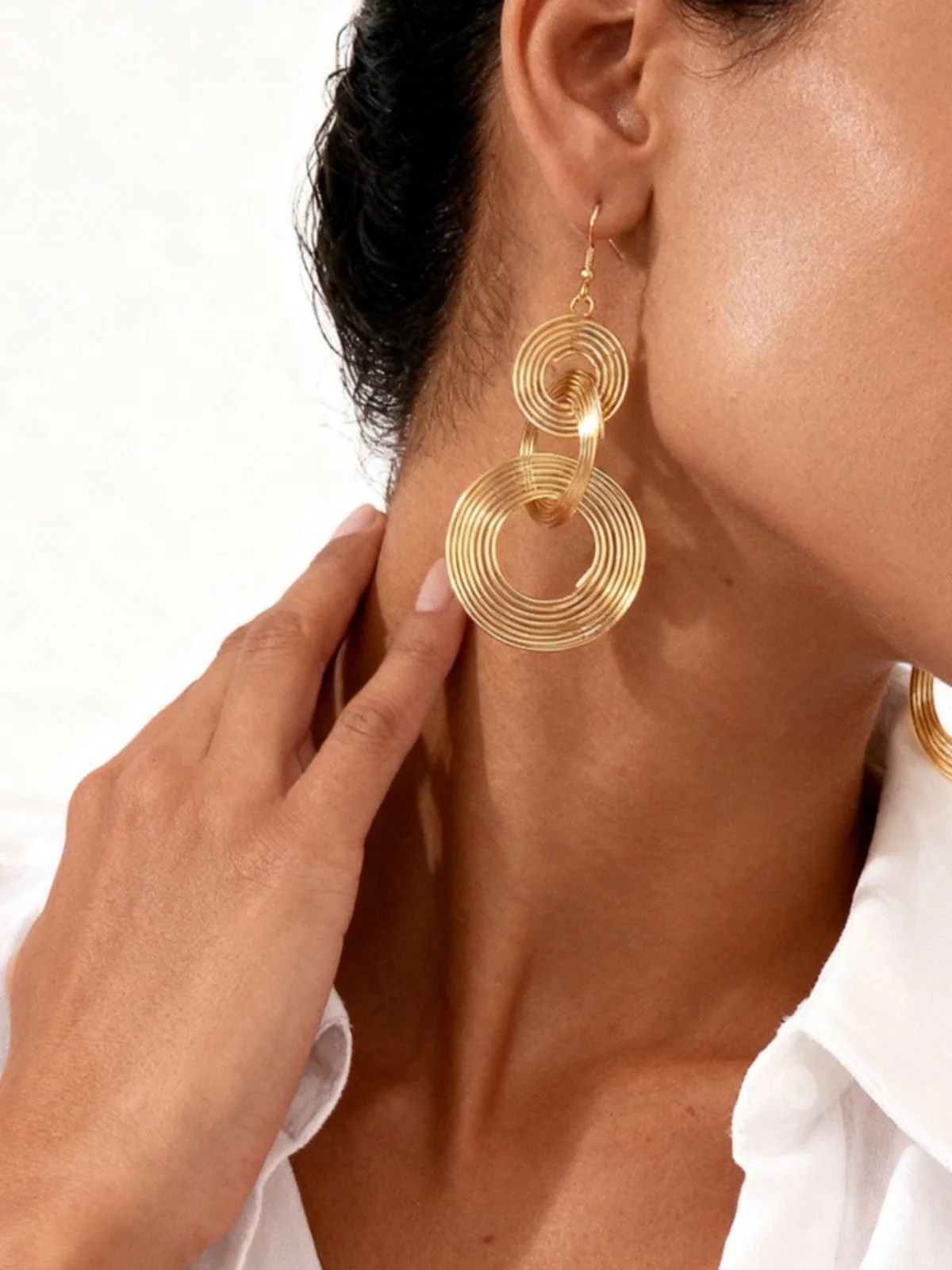 Boucles d'oreilles vintage en alliage doré à spirale exagérée - Image 4