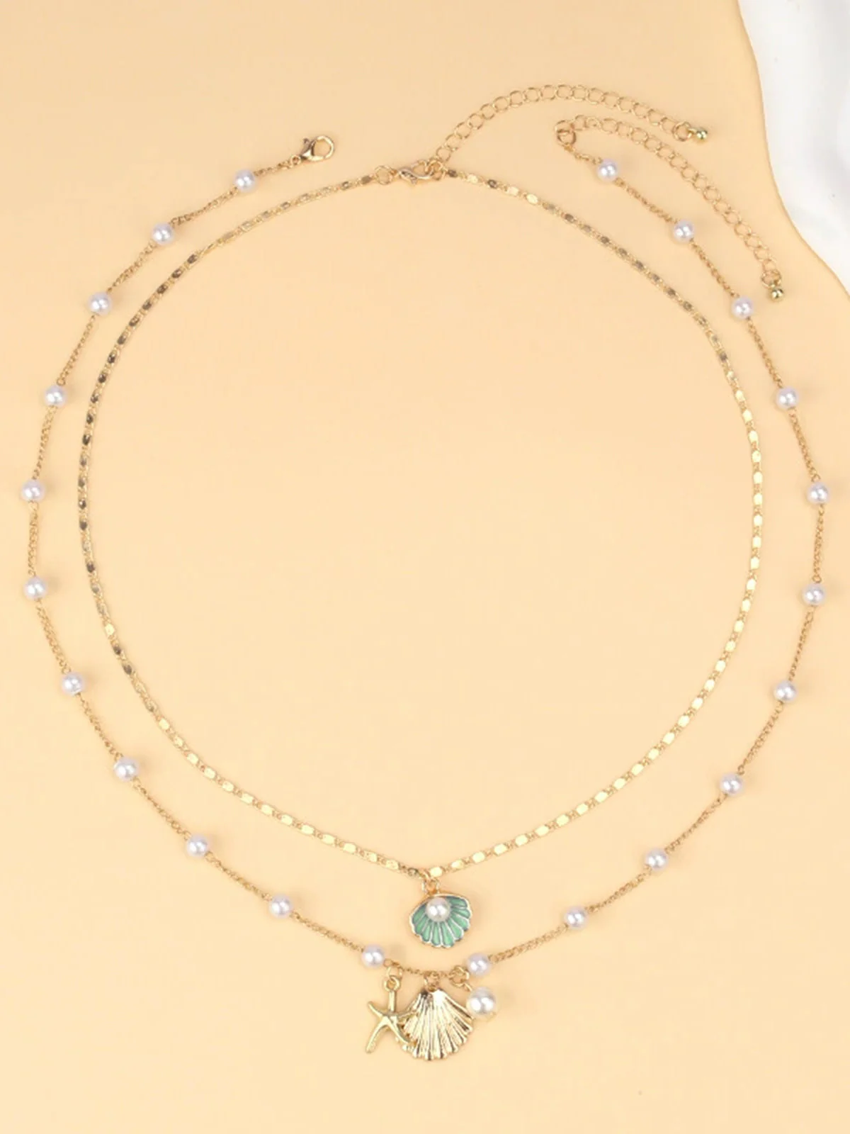 Collier superposé en coquillages perles et étoiles de mer - Image 2