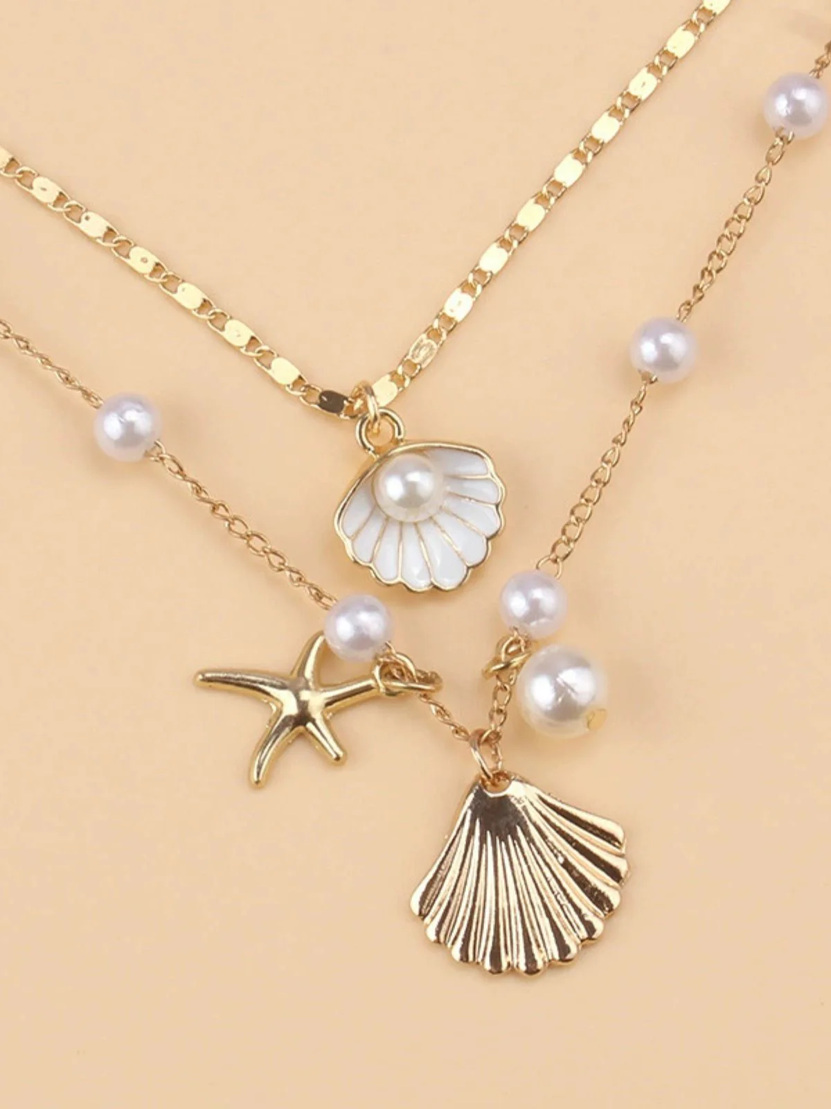 Collier superposé en coquillages perles et étoiles de mer - Image 3